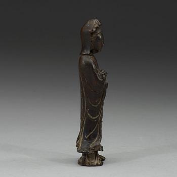 A bronze standing Guanyin holding a ruyi-scepter, Qing dynasty, 18th century.