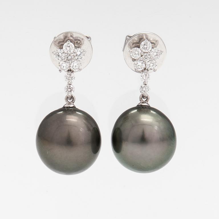 A pair of 18K white gold earrings with tahiti pearls and diamonds ca. 0.54 ct in total.