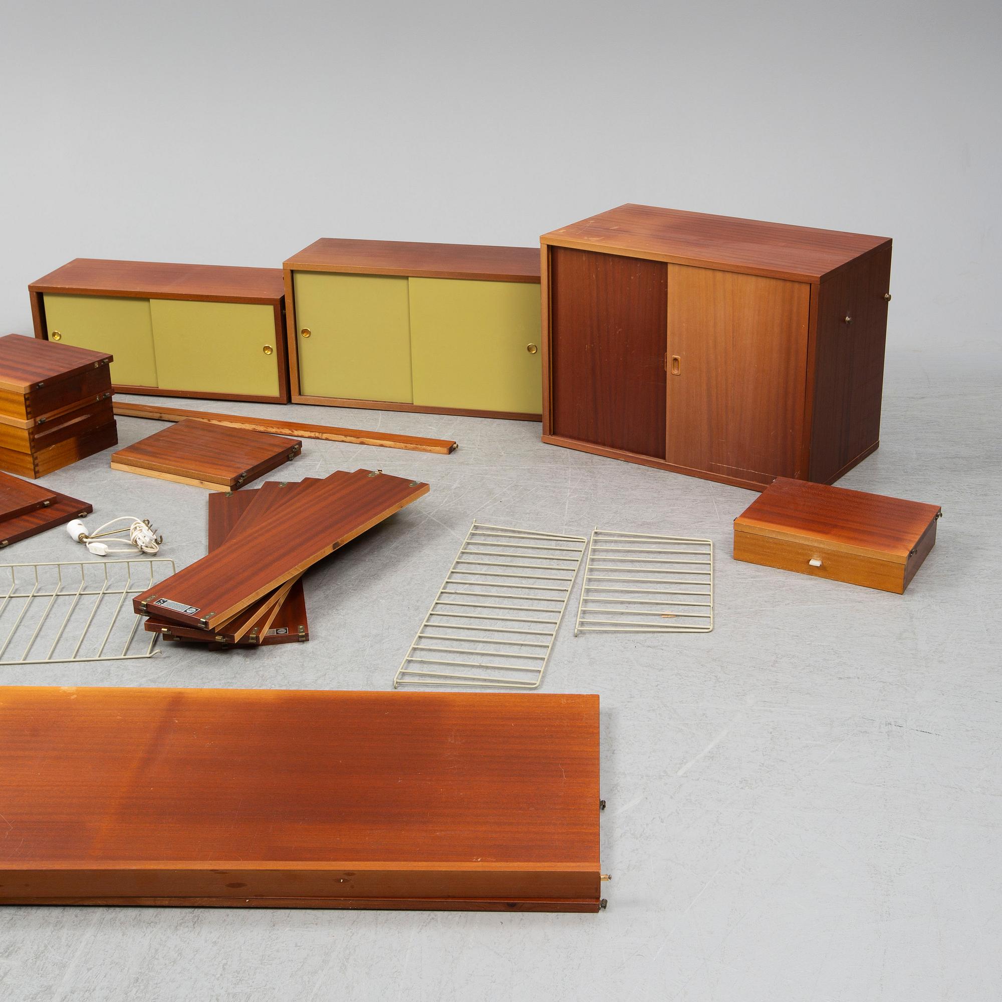 NILS & KAJSA STRINNING, a 'String' mahogany veneered shelf system, 1962.
