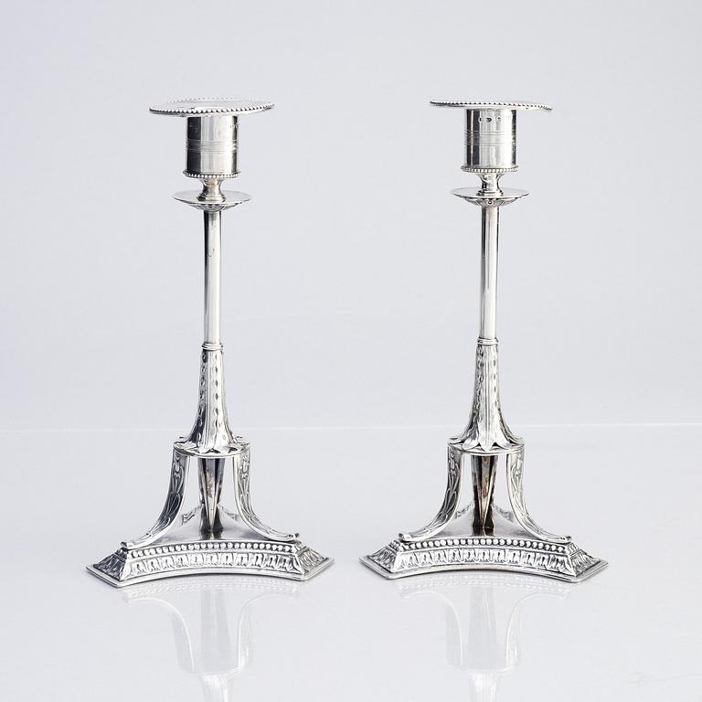 A pair of Swedish early 19th century silver candlesticks, marks of Adolf Zethelius, Stockholm 1817.