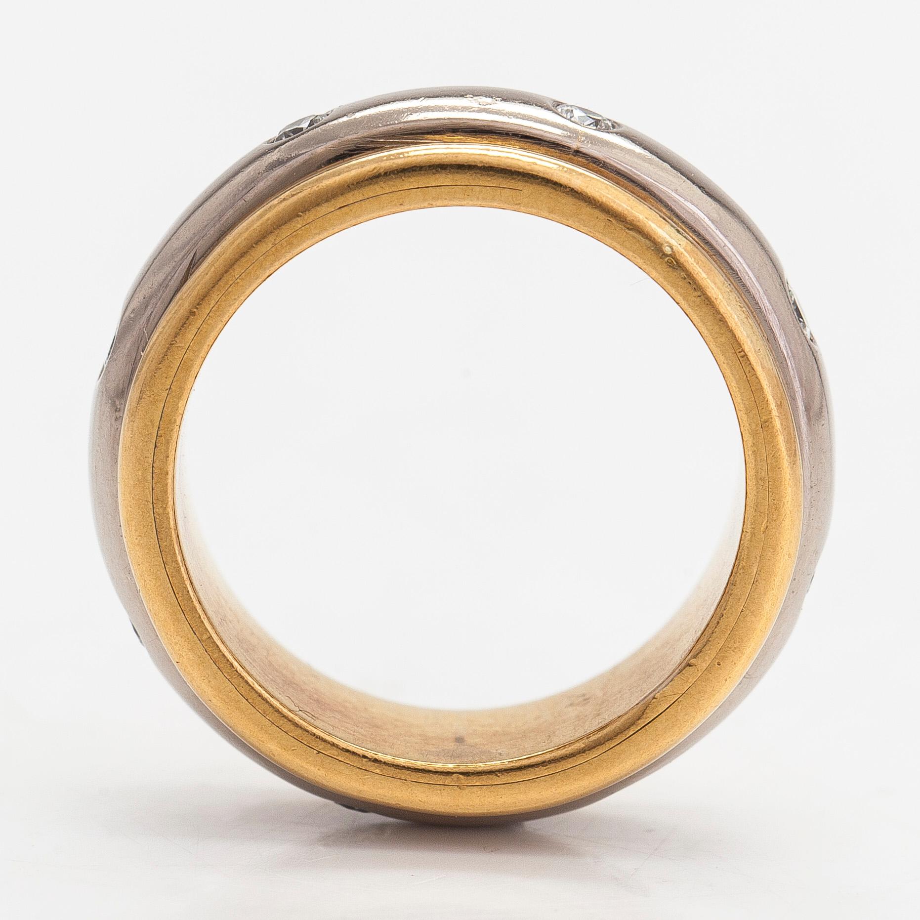 An 18K white/yellow gold ring, diamonds totalling approximately 0.24 ct. Henri Pitkänen, Helsinki.