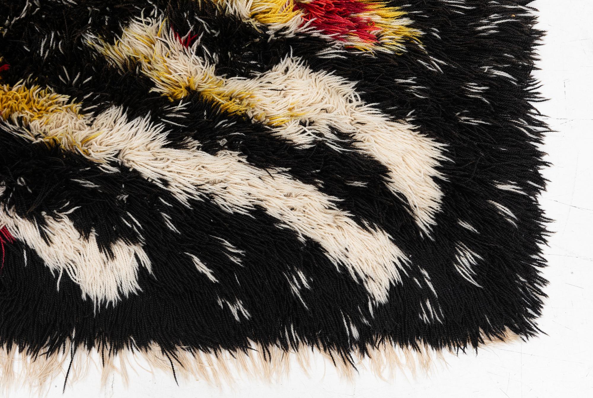 A carpet, knotted pile, ca 200 x 143 cm.