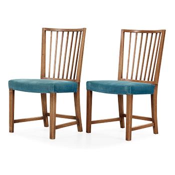 499. Axel Einar Hjorth, a pair of stained oak chairs, Stockholm 1940's.