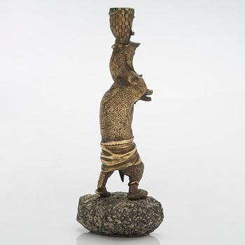 A Russian bronze candle holder, circa 1900.