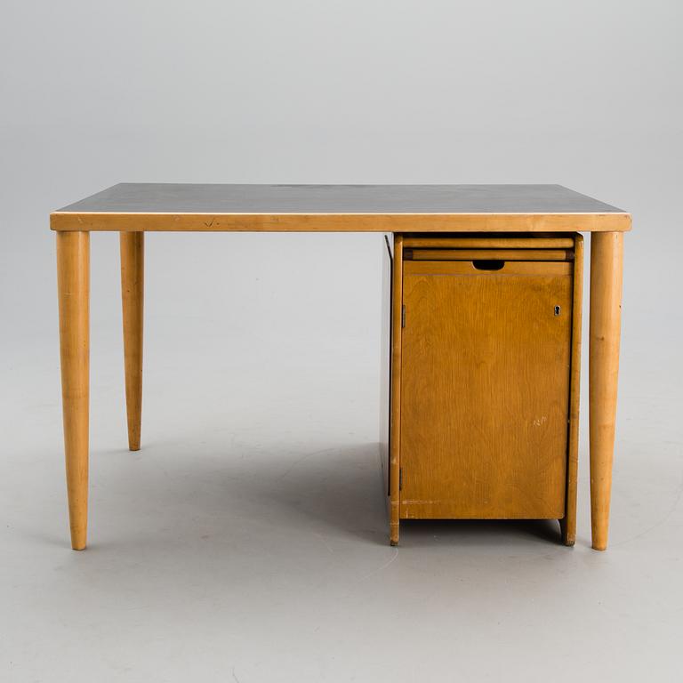 A writing desk and chest of drawers from the Domus Acadamica campus in Helsinki, designed in the 1940s.