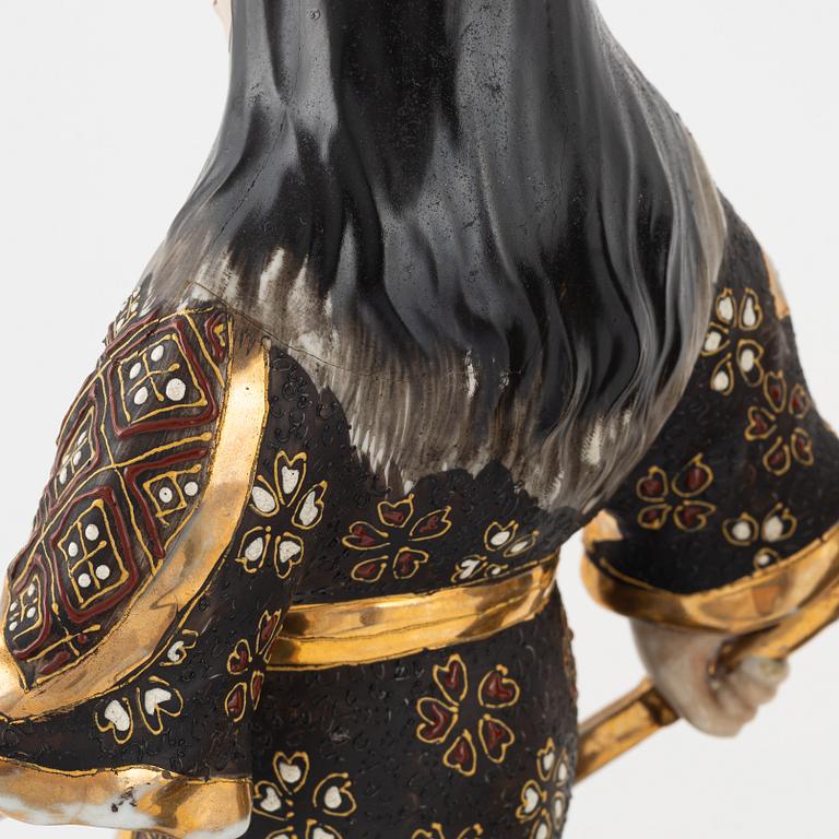 A pair of Japanese porcelain figurines, 20th century,