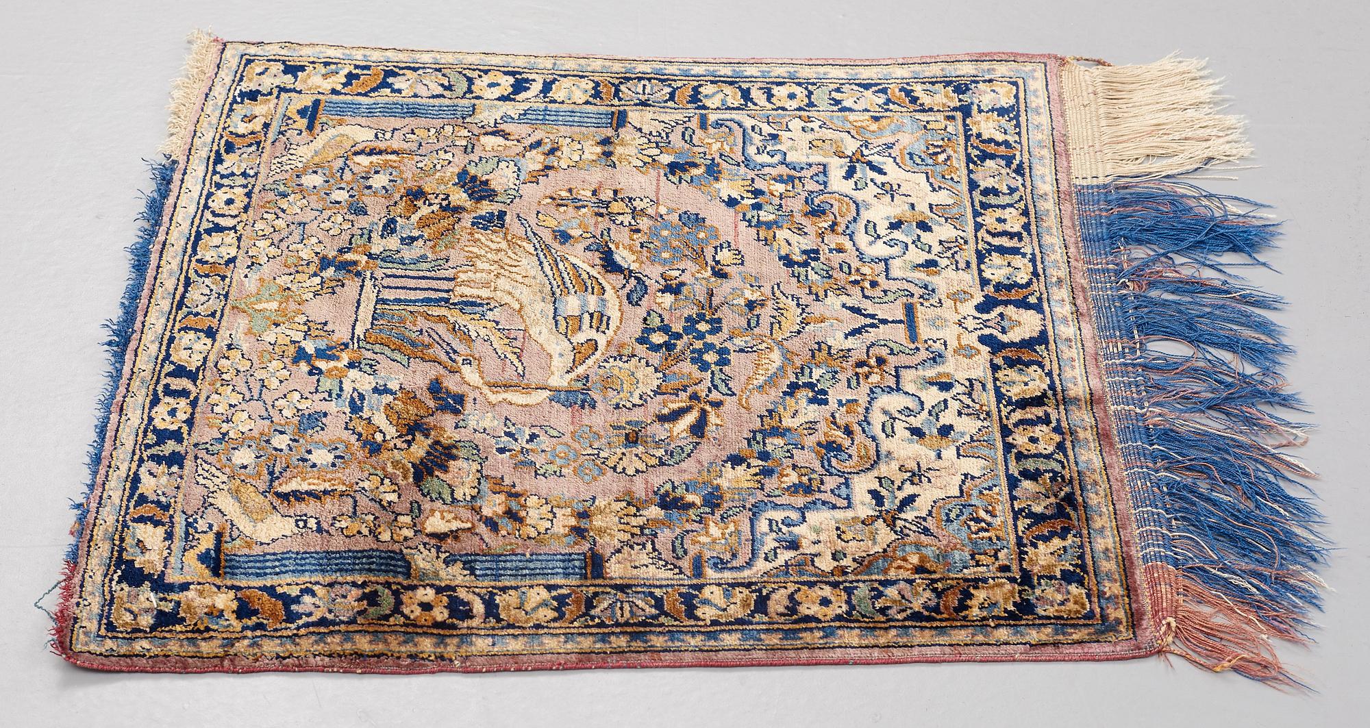 MATTO, a semi-antique silk Kashan possibly Motachem, ca 51-52,5 x 48.5-51 cm.