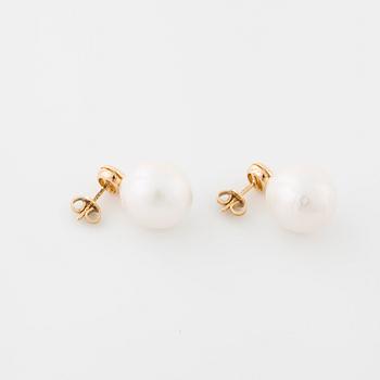 A pair of cultured pearl and princess cut diamond earrings.