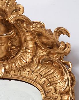 A Rococo dragon mirror.