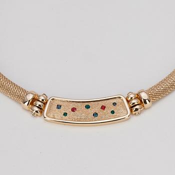 CHRISTIAN DIOR, a necklace and a pair of earrings.