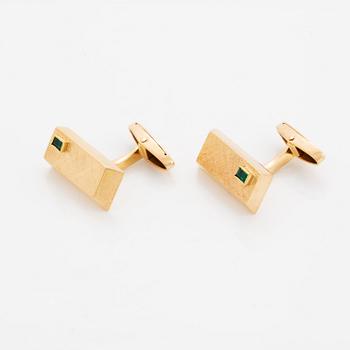 Cufflinks, 1 pair, 18K gold with 2 rectangular cut emeralds.