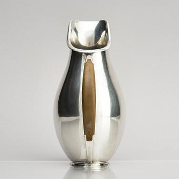 Anton F. Rasmussen, a silver water pitcher with bakelite handle, Aarhus, Denmark, cirka 1950s.