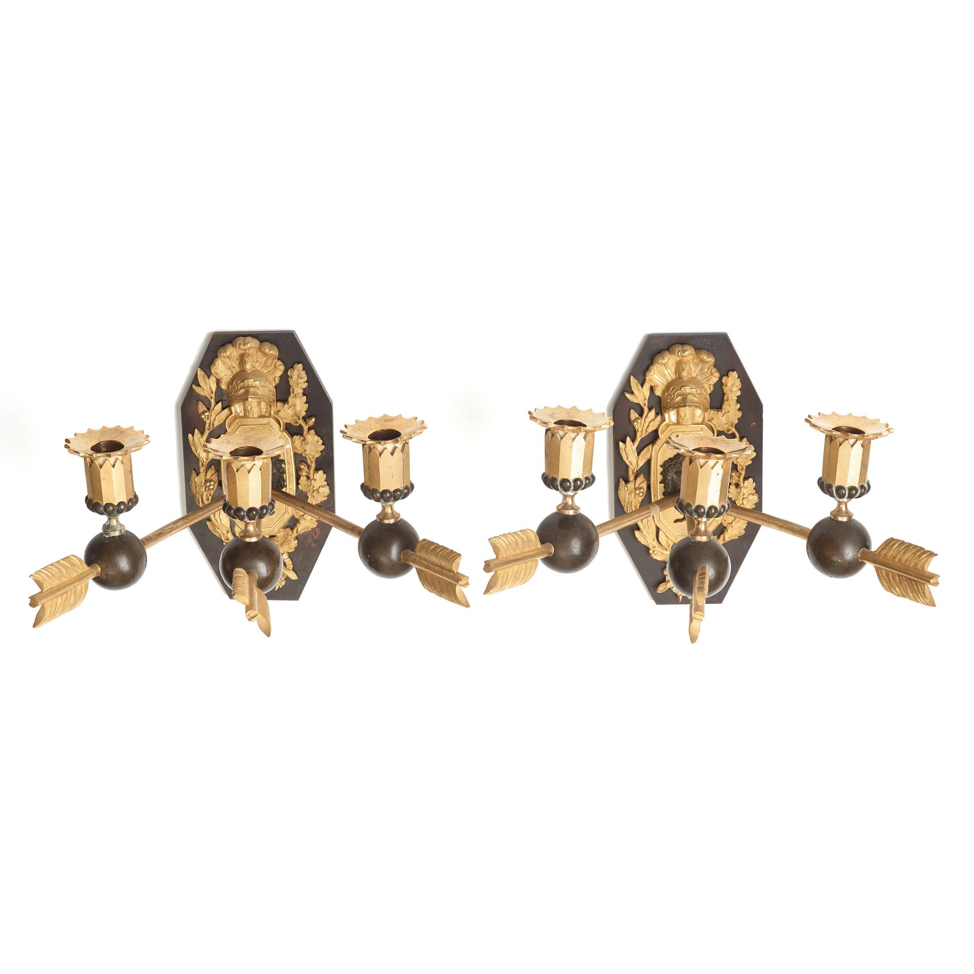 A pair of Empire three-light wall-lights, early 19th century Stockholm or St Petersburg.
