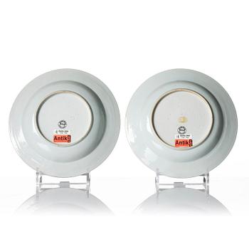 A Qianlong blue and white charger and a pair of famille rose dishes.