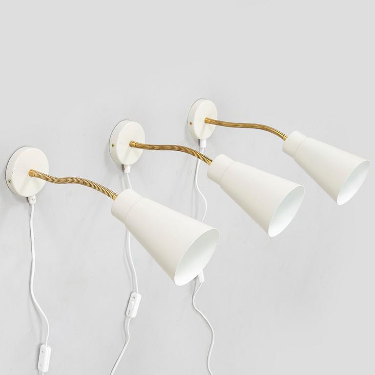 A set of three mid-20th century wall lights, model AH6, for Itsu Finland.