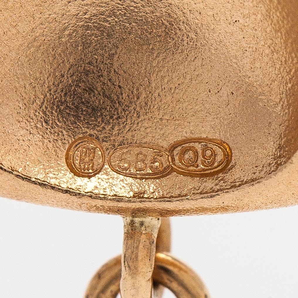 Kalevala Koru, hänge och ked, 14K guld, peridot, 2017.