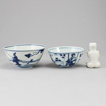 A set of two blue and white bowls and a figurine, Ming dynasty and Qing dynasty, 17th Century.