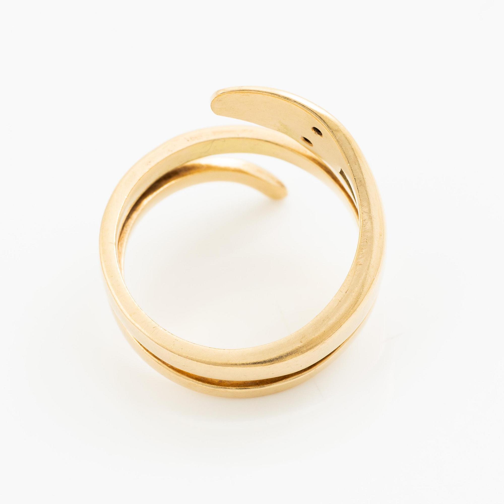 Sven-Erik Högberg, a ring in the form of a snake, 18K gold with round brilliant-cut diamonds, Gothenburg 1986.