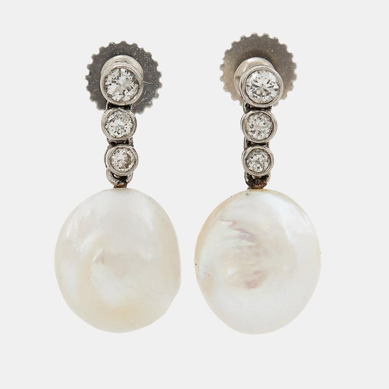 A pair of 18K white gold earrings set with pearls and round brilliant-cut diamonds.