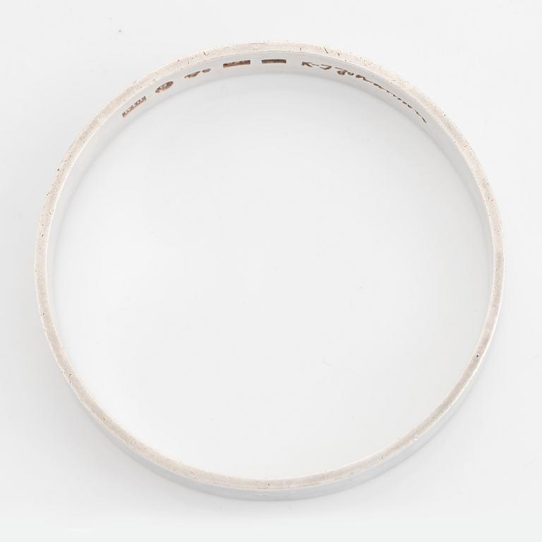 Karl-Ingemar Johansson a silver bracelet.