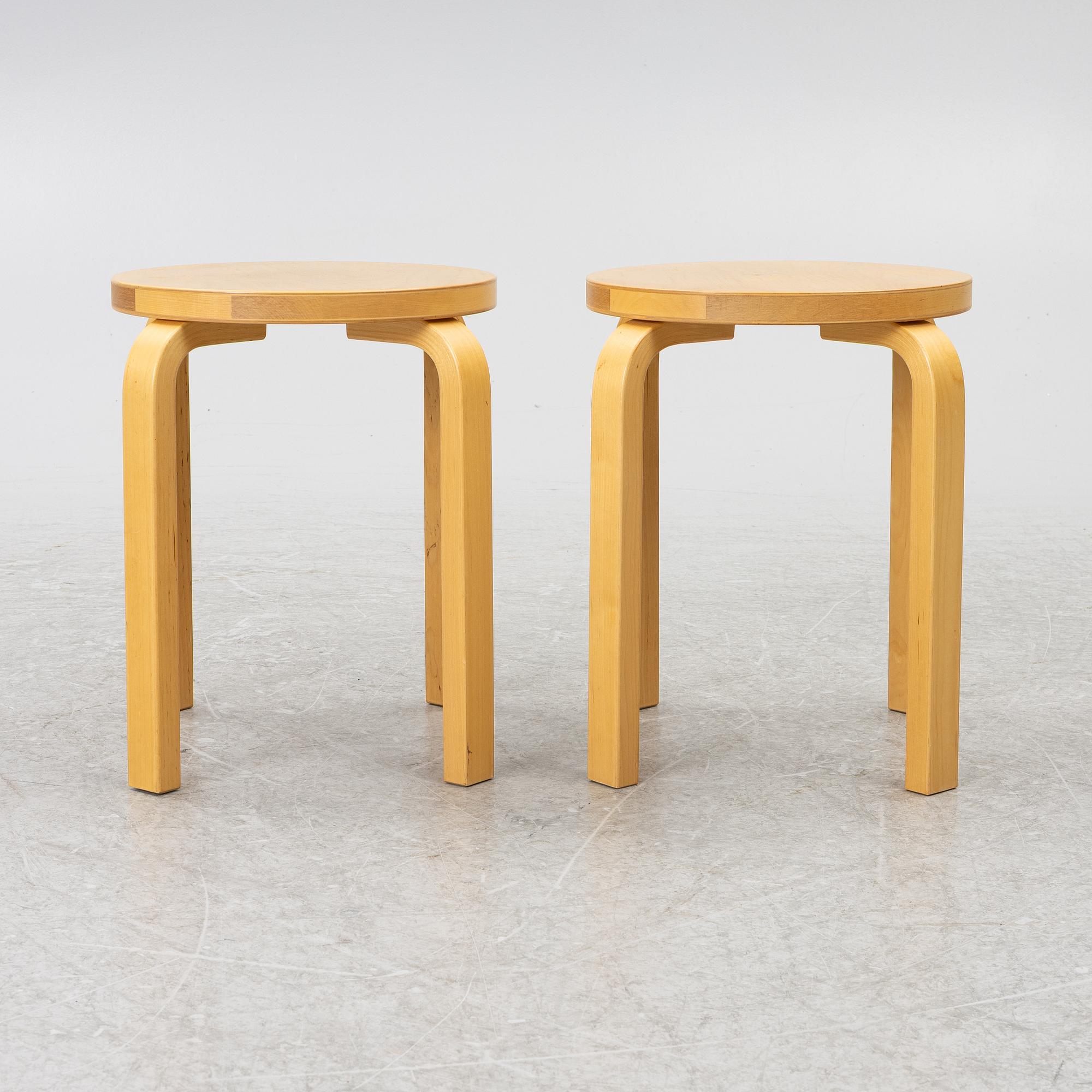 Alvar Aalto, a pair of model E60 stools, Artek, Finland.