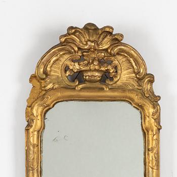 A Rococo mirror sconce, 18th Century.