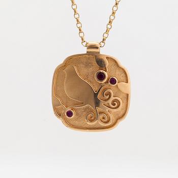 Necklace/pendant, 18K gold and rubies. The chain merked Unoaerre, Italy.