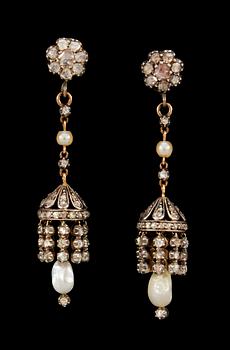 719. A pair of 19th cent silver, gold and rose cut diamond earrings.