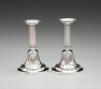 A pair of Swedish 19th century silver candlesticks, makers mark of Nils Tornberg, Linköping 1812.