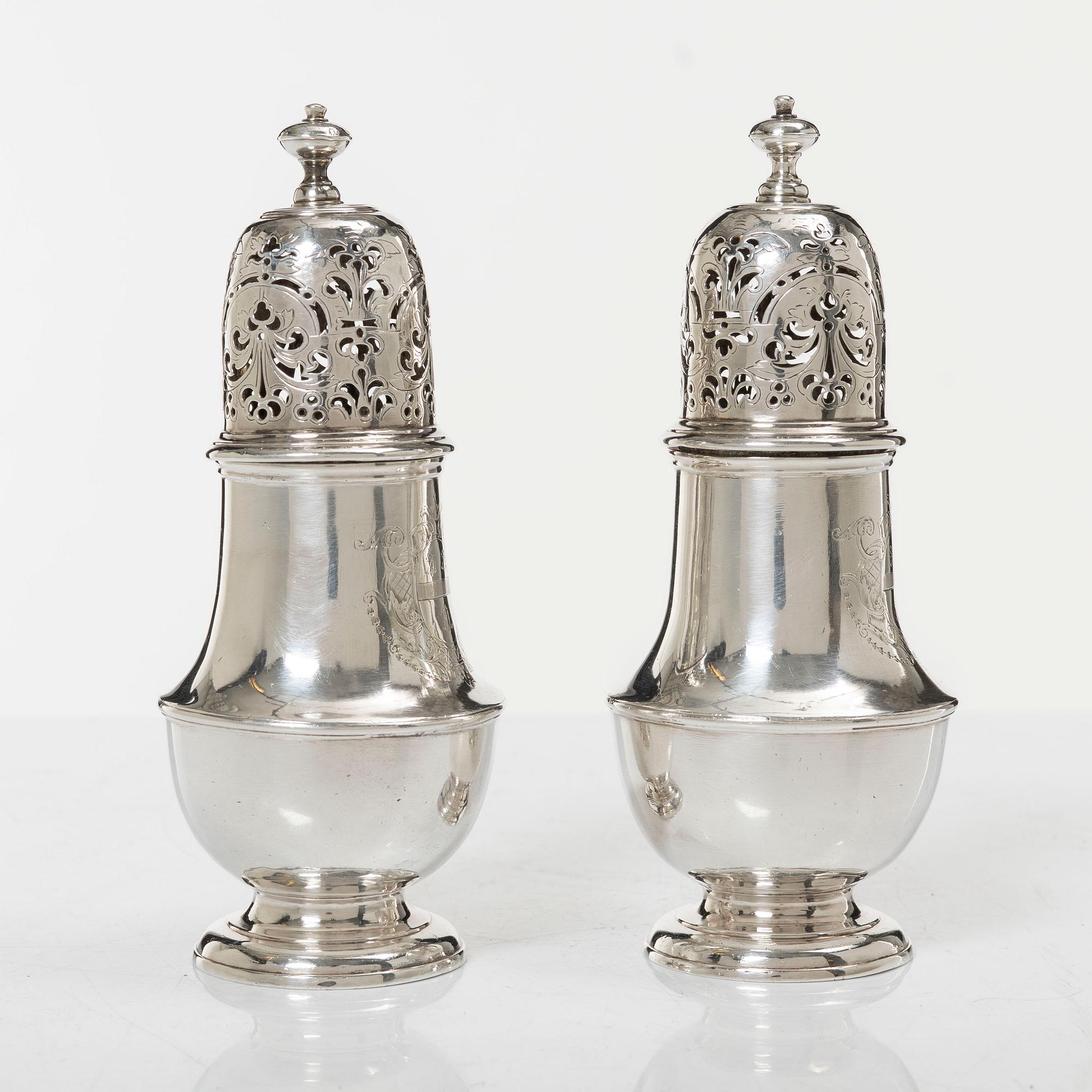 A pair of Britannia standard silver sugar-casters, marks of Samuel Welder, London, 1723.
