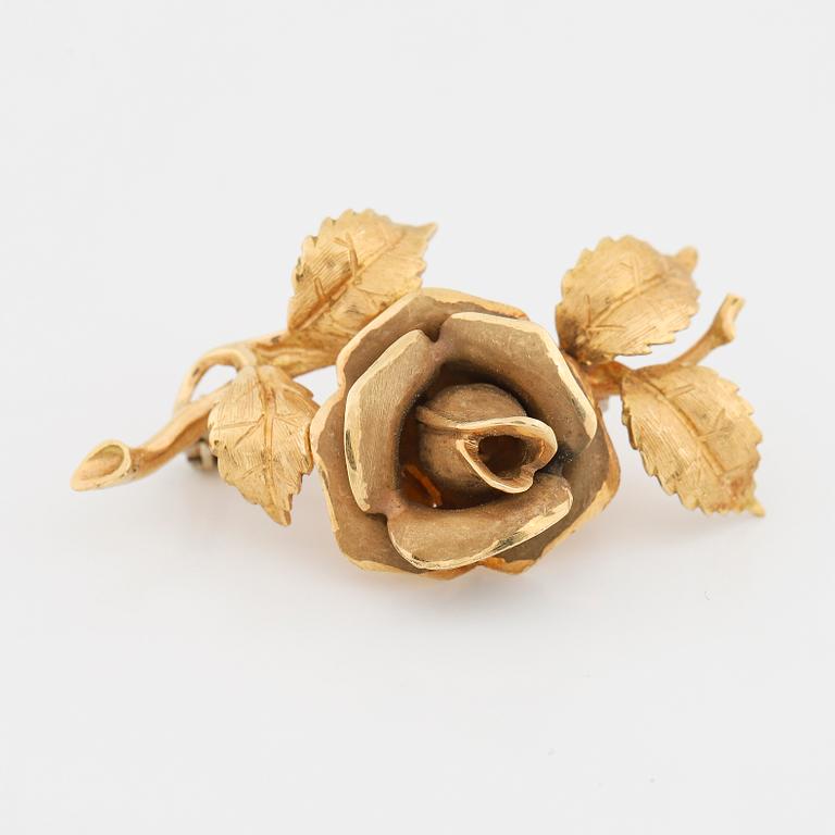 18K gold rose brooch.