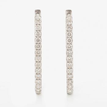 Earrings with brilliant-cut diamonds.