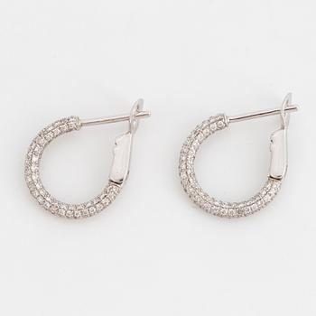 Brilliant-cut diamond pavé earrings.
