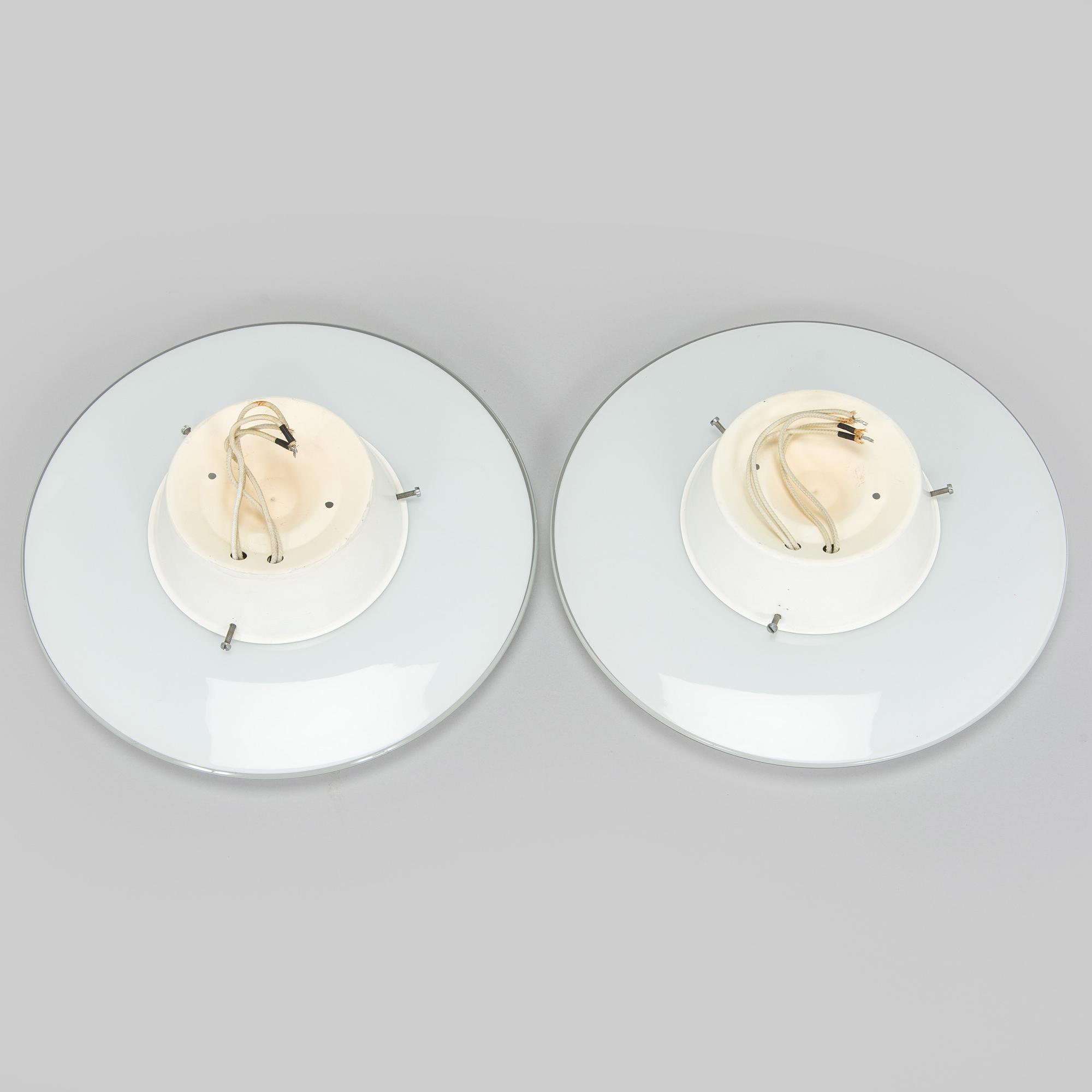 Arne Jacobsen, a pair of 1960's 'AJ-Eklipta' ceiling / wall lamps, for Louis Poulsen/licensed manufacturer Orno, Stockmann.