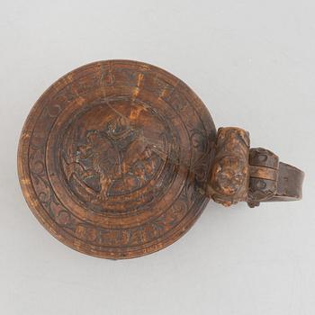 A Norwegian burr-birch tankard, circa 1800.