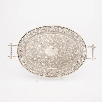 An early 20th century set of two Indian silver trays, weight 1526 grams.