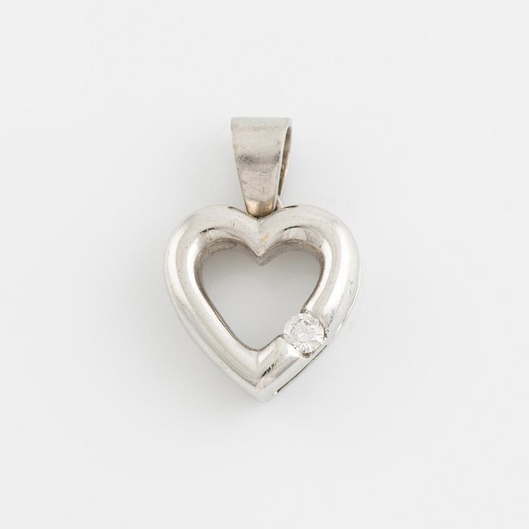 White gold and brilliant cut diamond heart pendant.