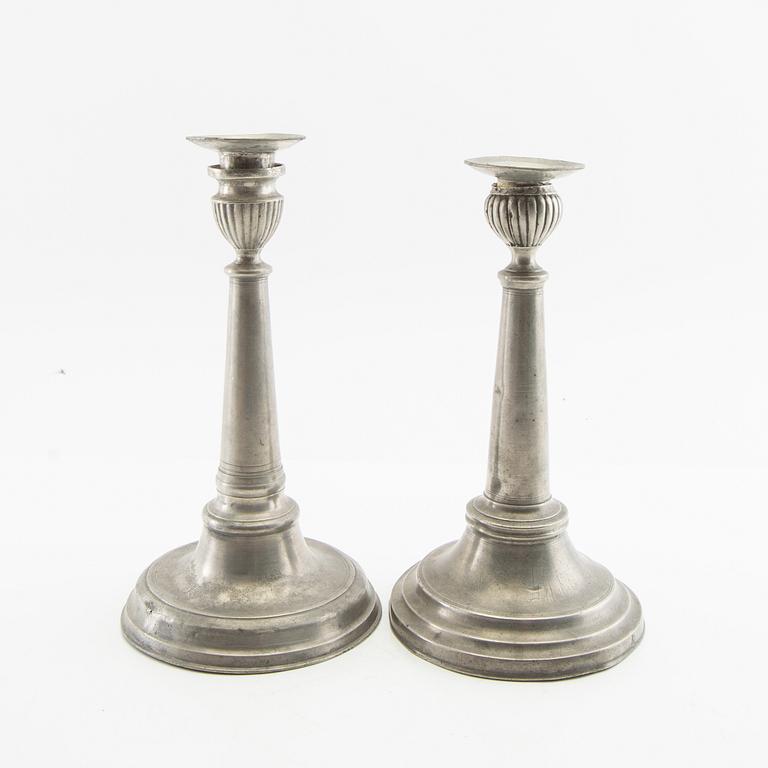 Candle holders, two pieces of pewter, 1850s.