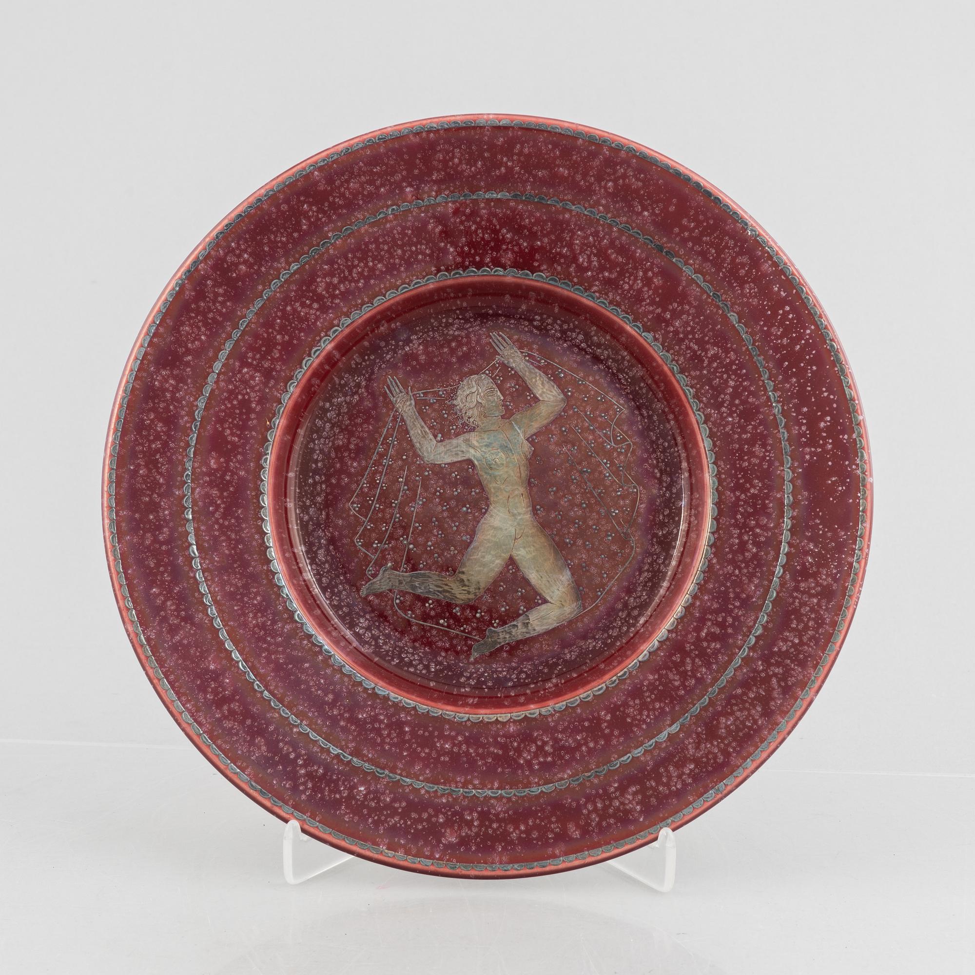 Wilhelm Kåge, a model 909 red "Argenta" dish, Gustavsberg, Sweden, 1943.