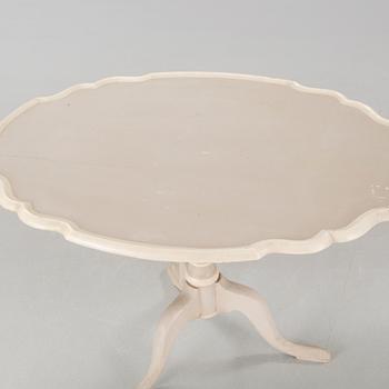 A late 19th century drop-leaf table.