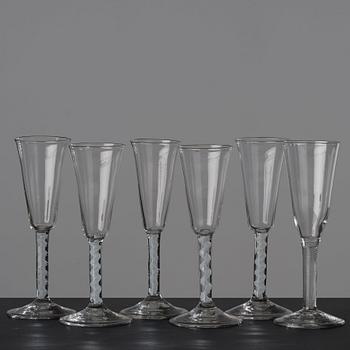 A matched set of six champagne flutes, England, 18th Century.