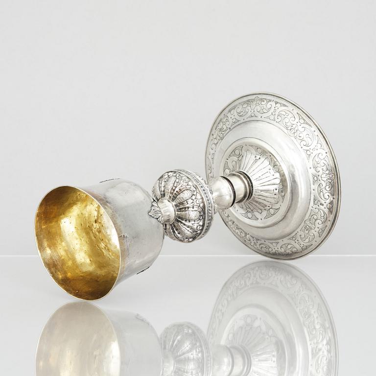 An 18th century parcel-gilt silver cup and paten, unmarked.