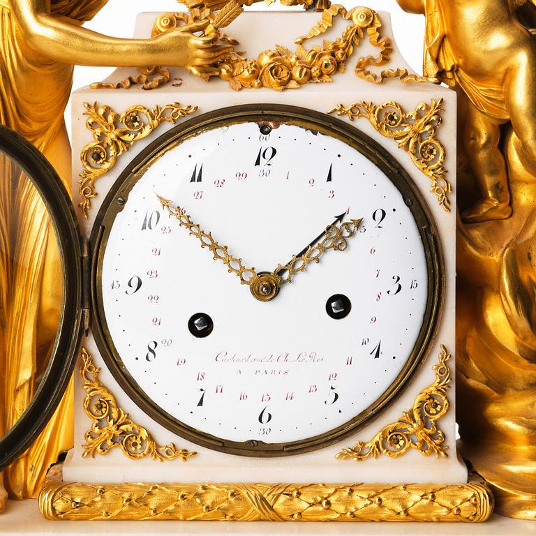 A Louis XVI marble and ormolu mantel clock, late 18th century.