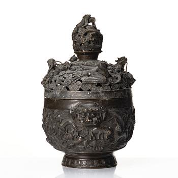 A bronze reticulated incense burner with cover, Qing dynasty (1644-1912).