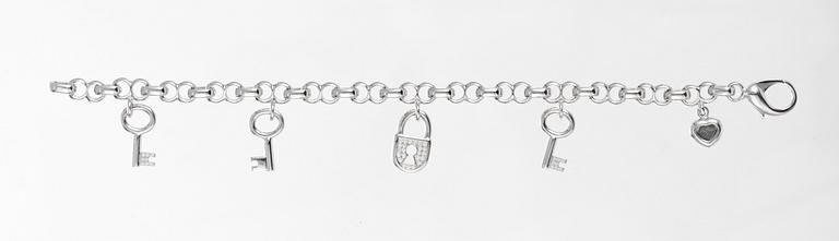 BRACELET, Chopard, five charms in the shape of heart, keys and locket.