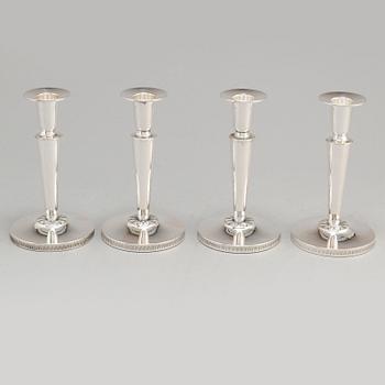 a set of four silver candlesticks by Ceson Gothenburg 1985-1987.