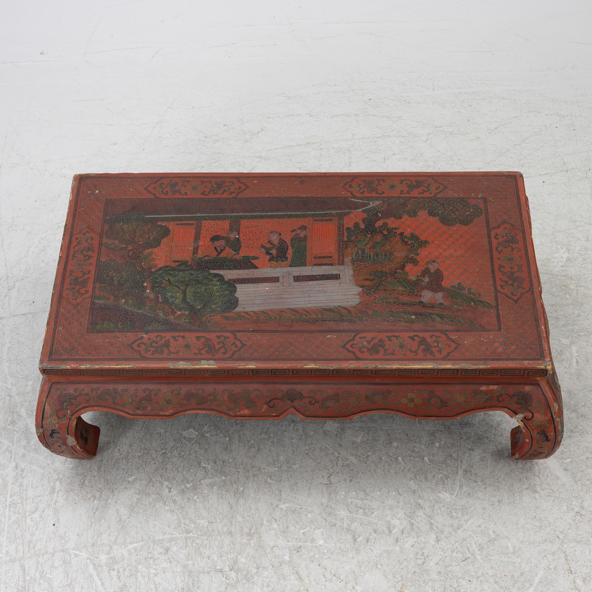 A Chinese red lacquered table, first quater of the 20th century.