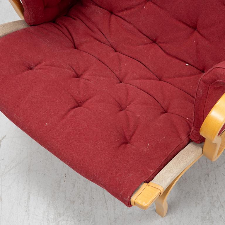 Bruno Mathsson, a 'Pernilla' armchair and a stool, Dux.