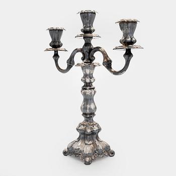 Kynttelikkö, hopea, Kultakeskus, Hämeenlinna 1990.