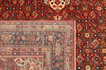 A carpet, Hosseinabad, approx. 510 x 384 cm.